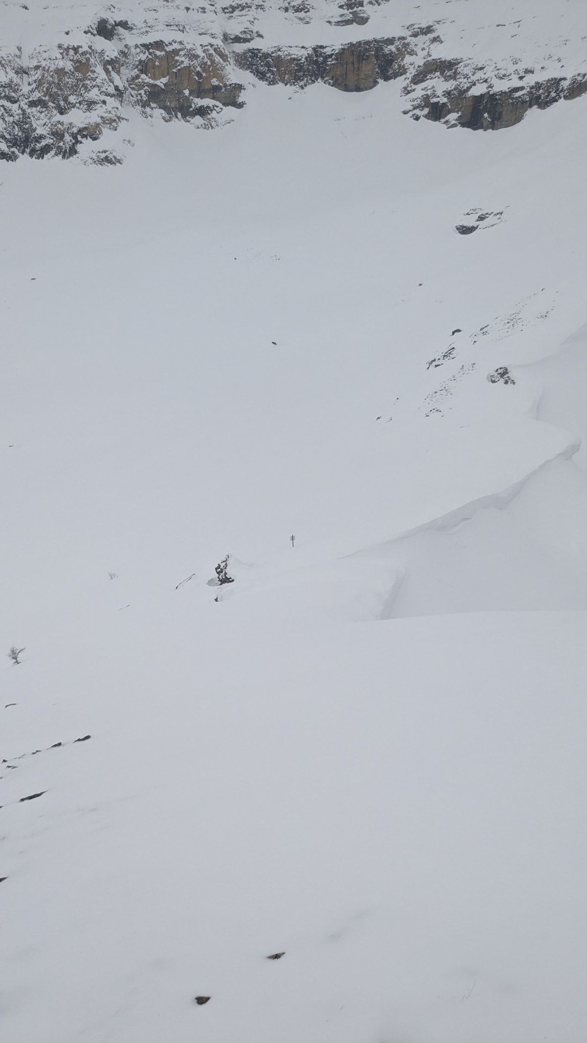 Looking down on the sign. Note the gap in the cornices. That's where we snuck through.