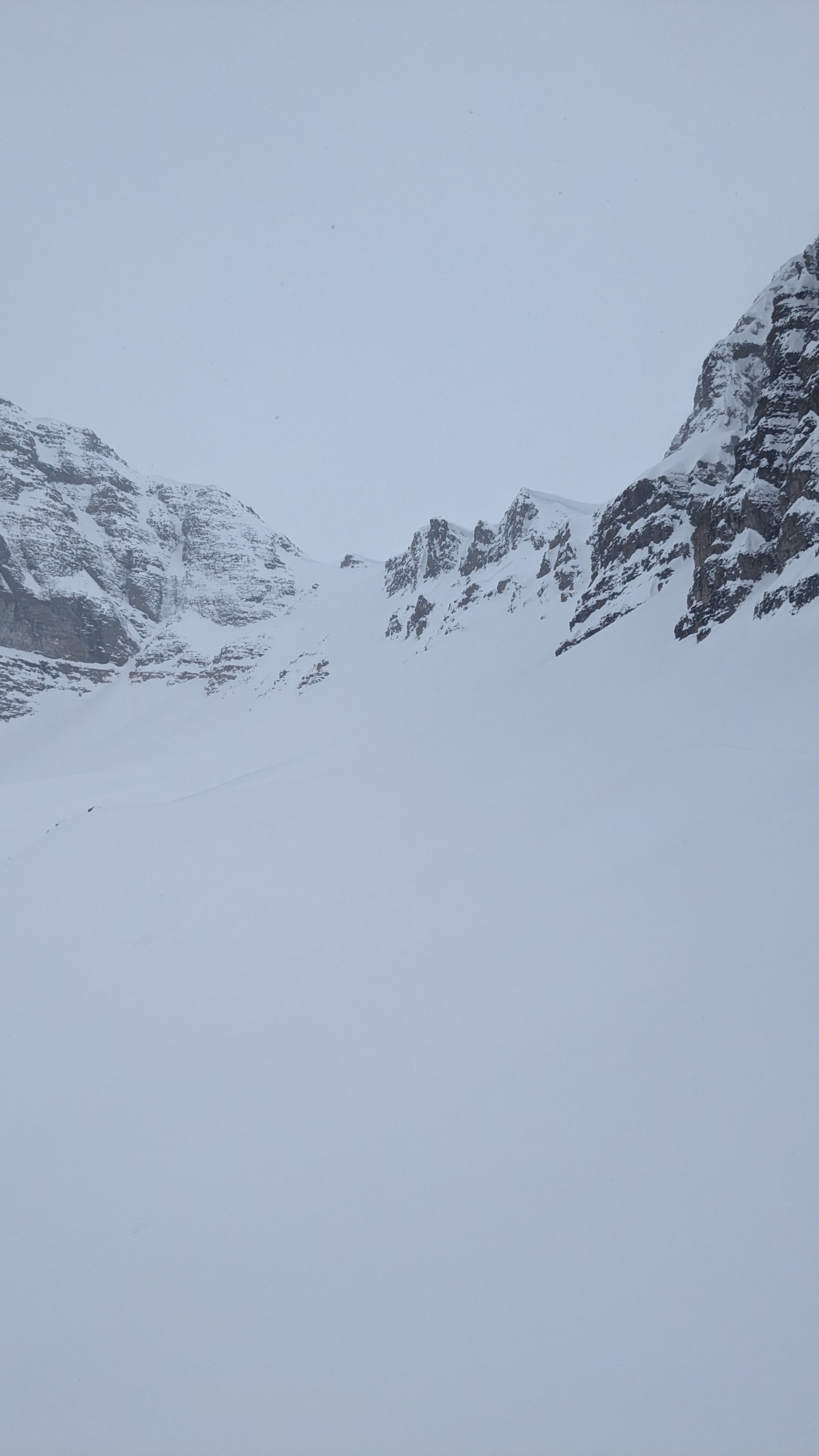 Looking back at Consolation Pass. Our line is out of sight on the right, under the big cornice. Planned route was the left. 