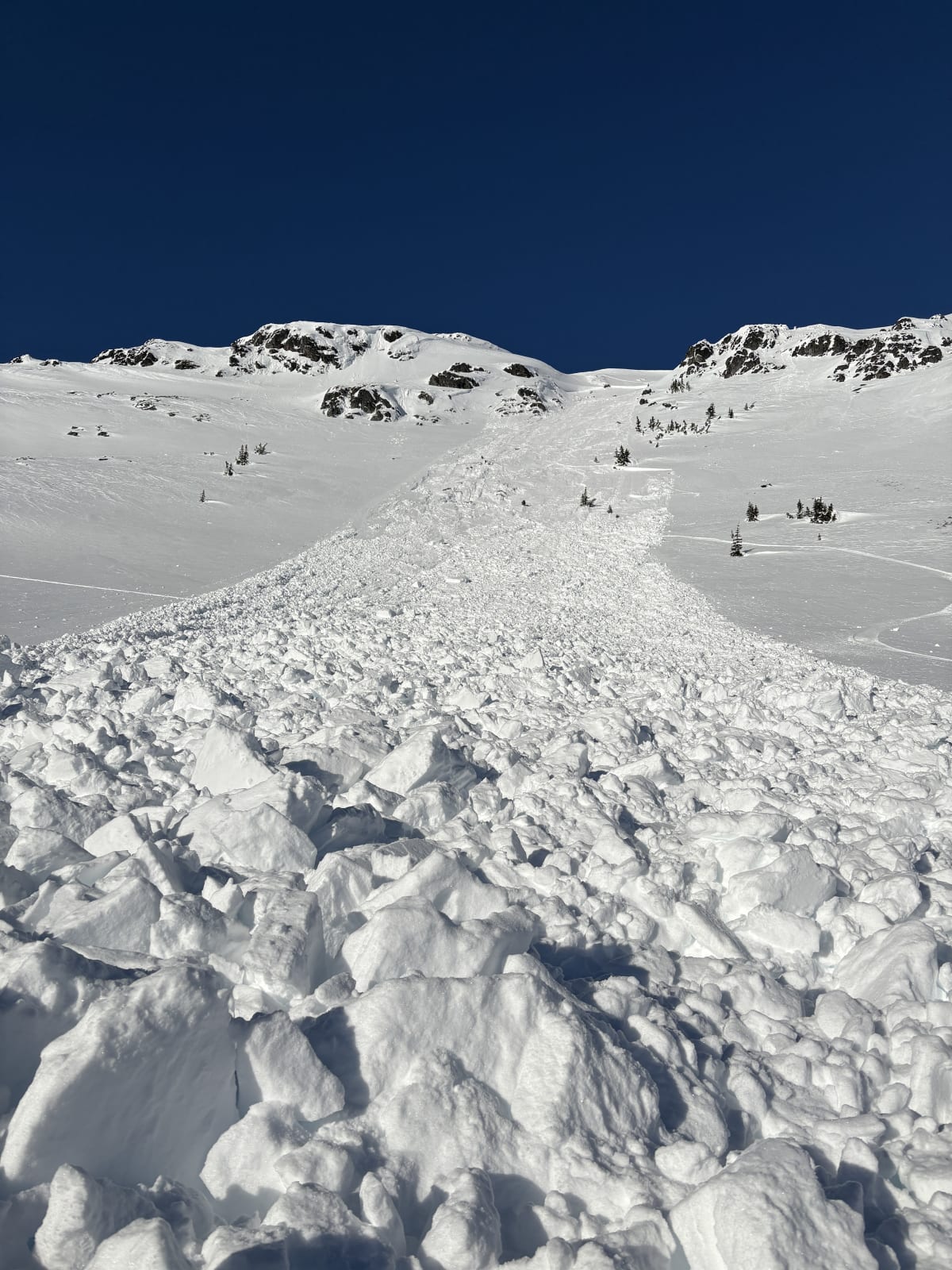 At the base of the slide