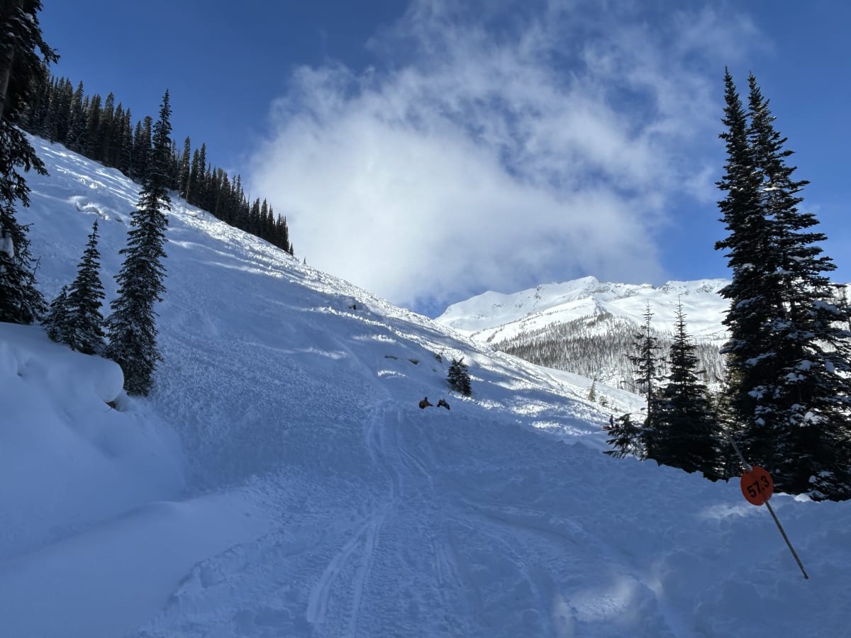 people passing over the debris to access Silent Pass
