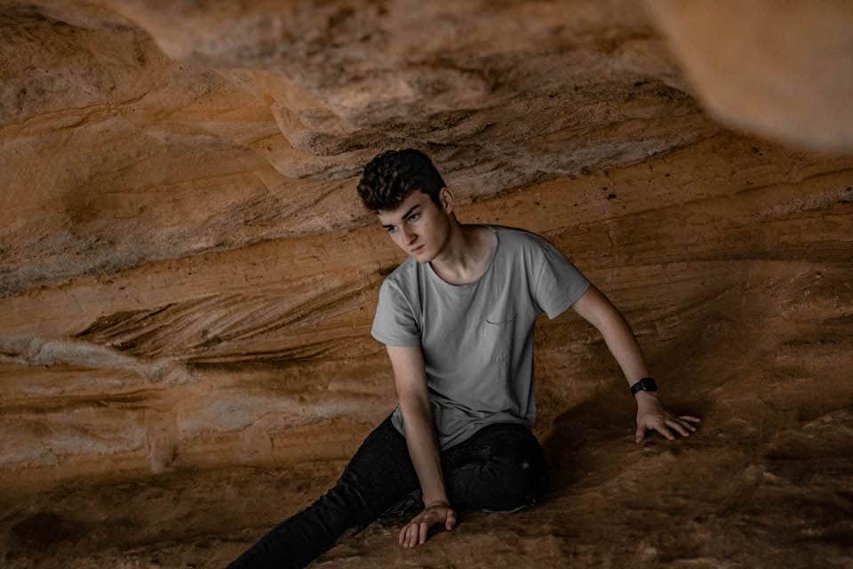 Lorenzo Wood, Summer 2021, in front of a cave in Southern California