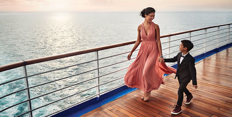 Mother and son walking the deck on Emerald Princess
