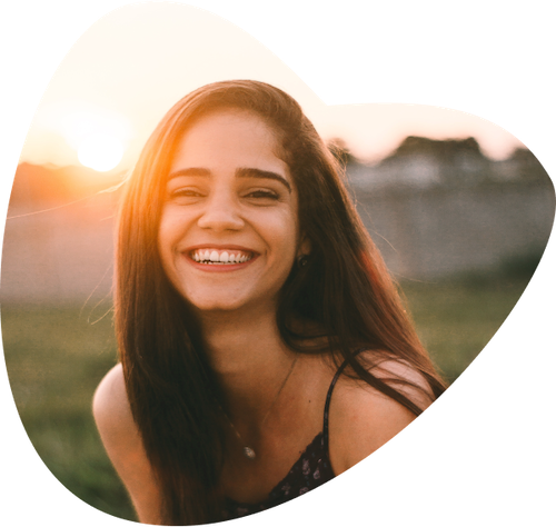 Photo of smiling lady by Hian Oliveira borrowd from Unsplash