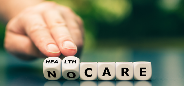 Hand turning the Health Insurance Option portraying the risk