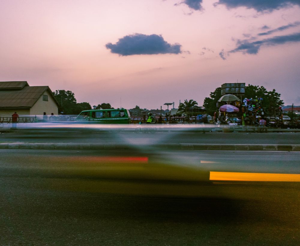 Motion blur of a taxi speeding through Challenge road