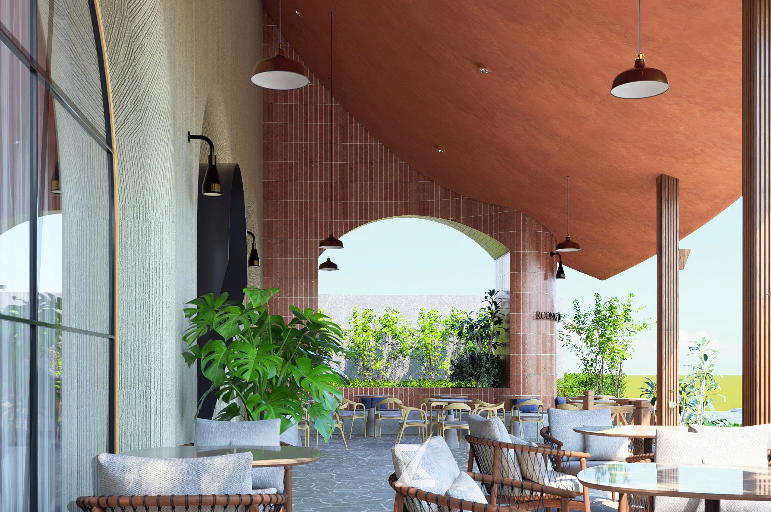 Không gian cafe bán ngoài trời mát mẻ với vòm gạch thẻ terracotta và nội thất sofa thư giãn