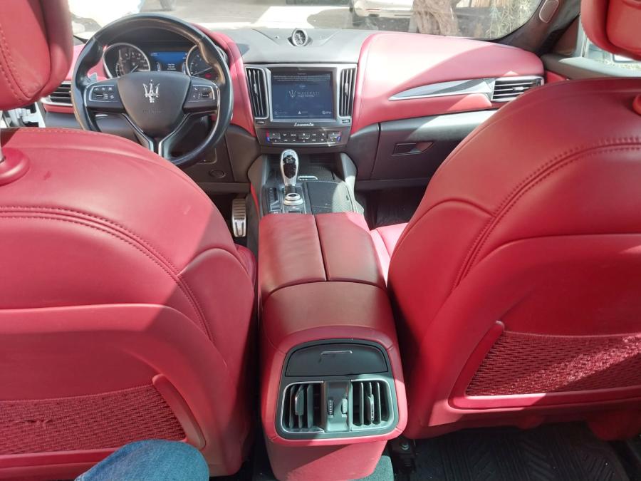 Red leather front seats and dashboard of the Maserati Levante