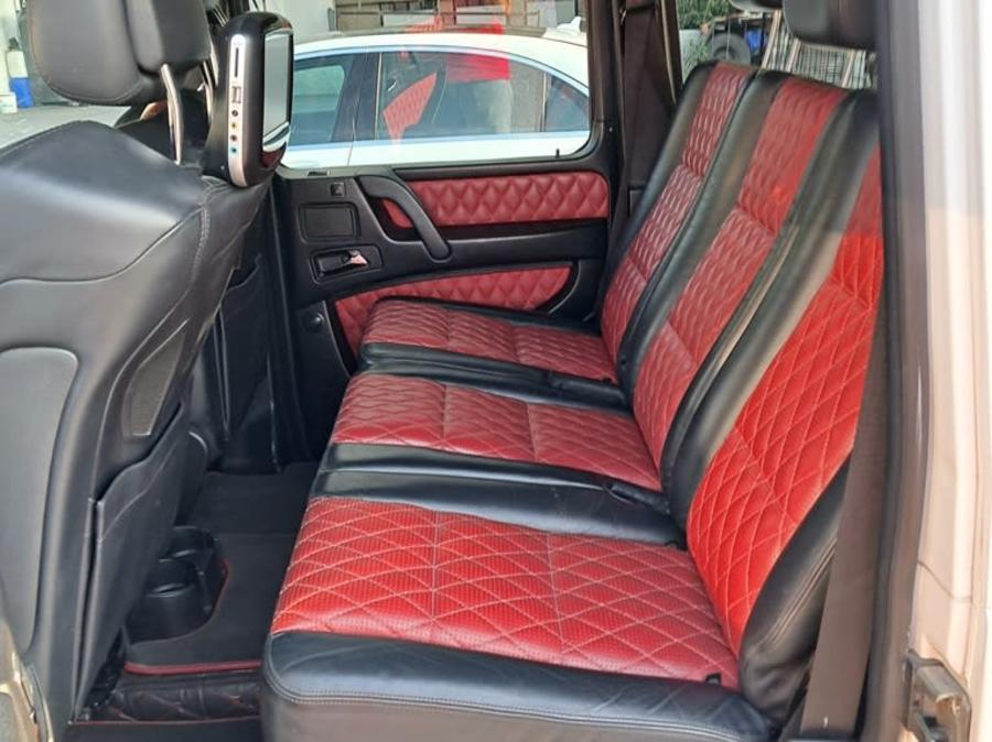 Red and black quilted leather rear seats of the Mercedes-Benz G-Class