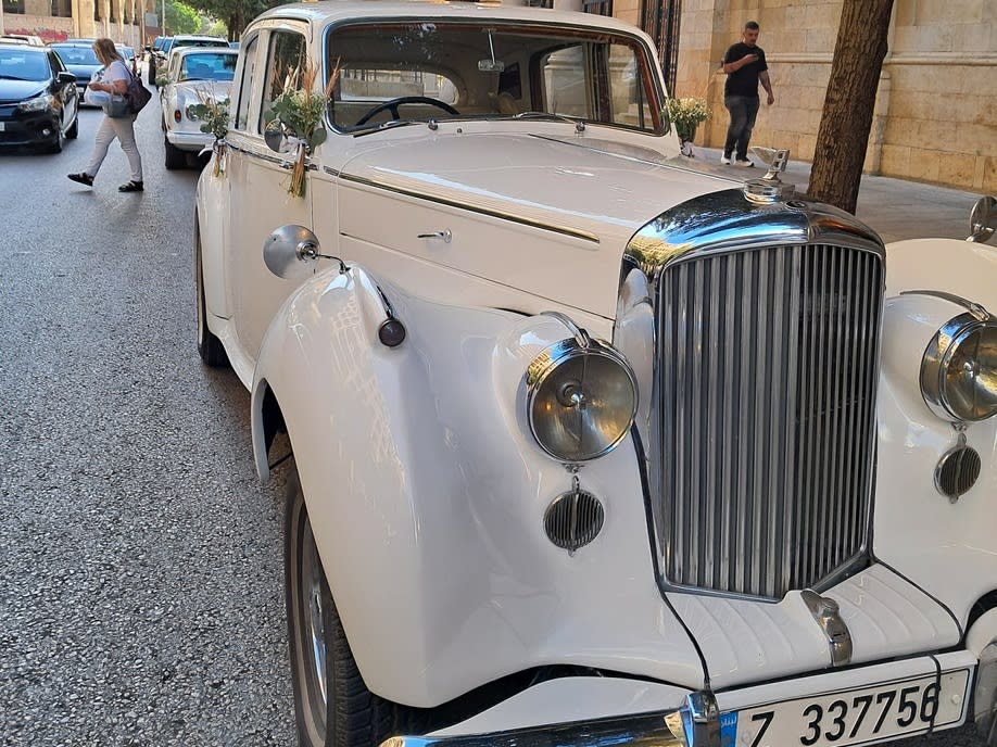 Close-up of the 1953 Bentley R Type's chrome grille and headlights