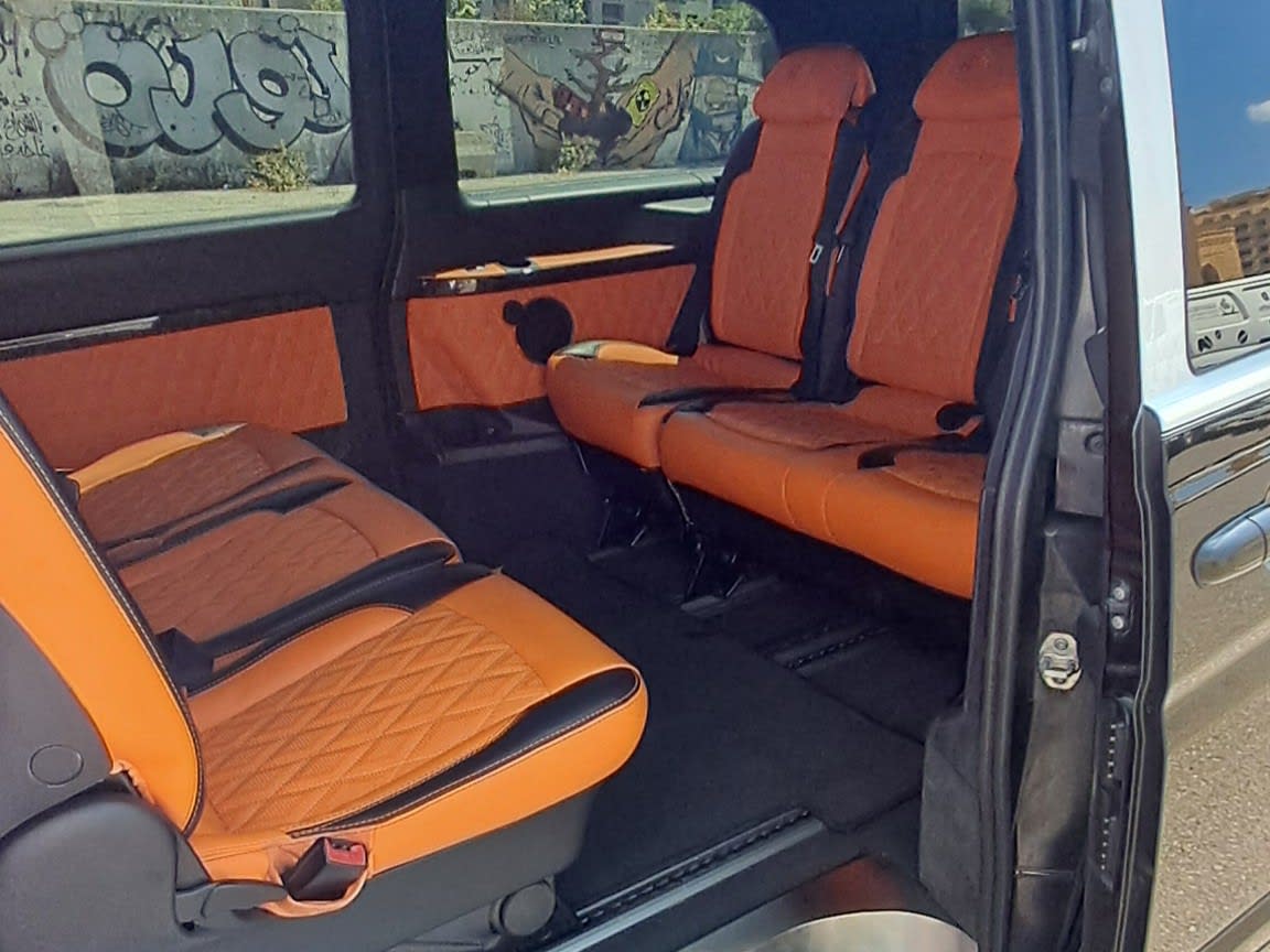 The orange luxury interior  of the Mercedes Maybach van
