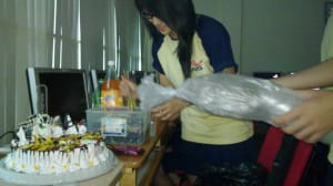 Joy preparing for the surprise party Joy preparing for the surprise party
