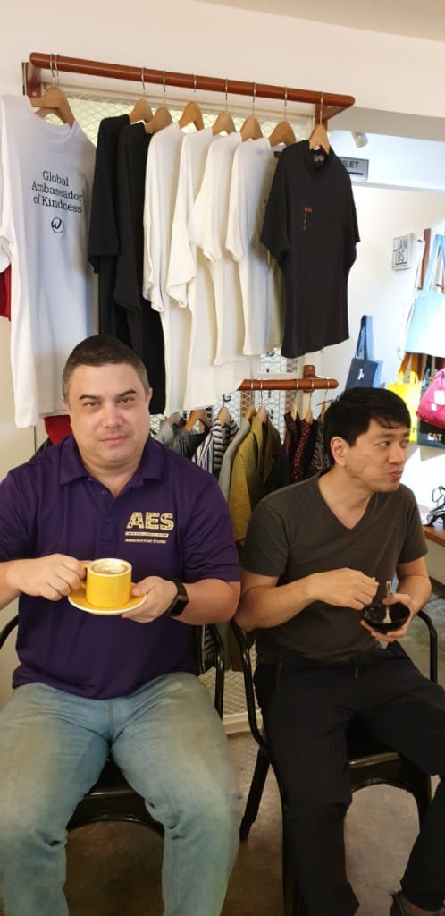 Catching up with Tomo, glaring at Tam, drinking my cafe mocha - Saigon Siblings