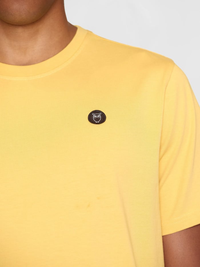 Loke Badge Tee misted yellow