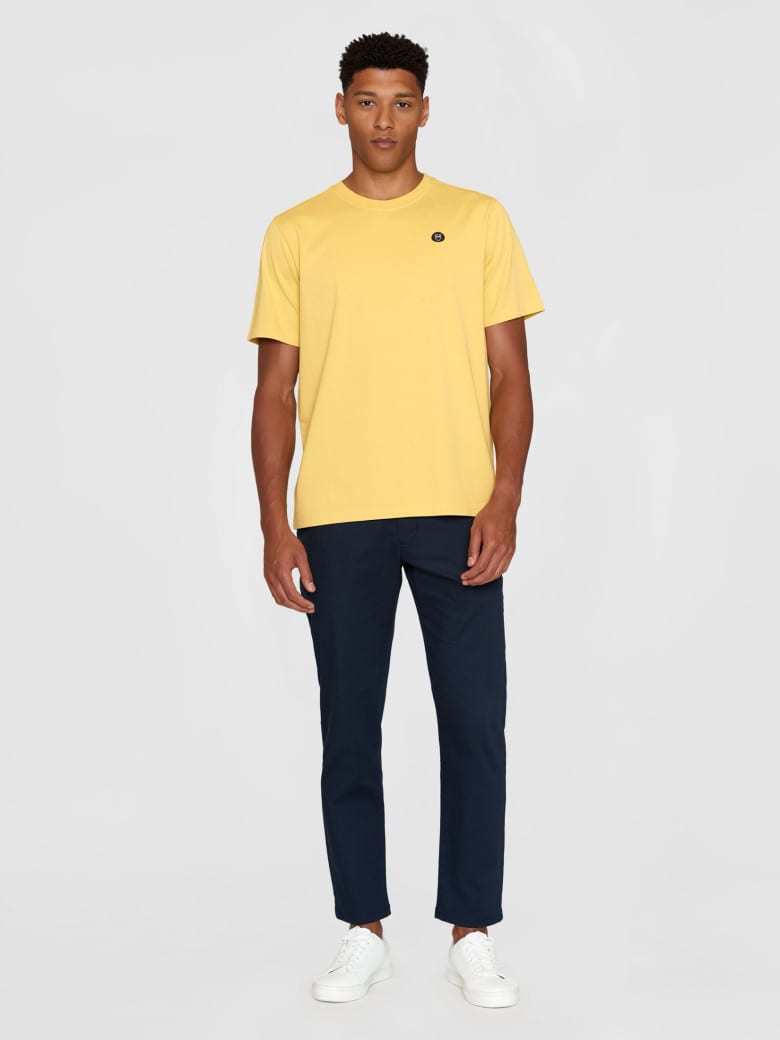 Loke Badge Tee misted yellow