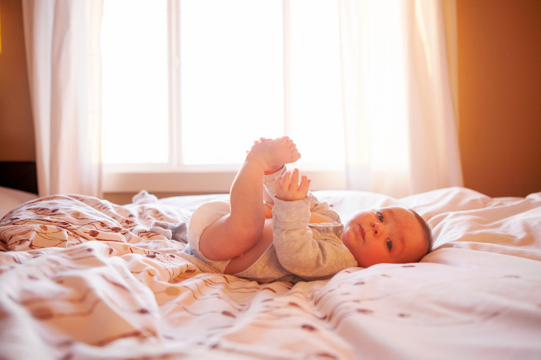 raising mattress in crib