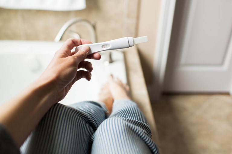 Pregnancy symptoms but negative test: What it could mean