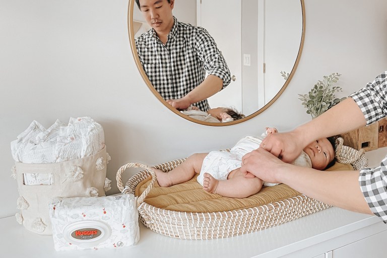 Caucasian Toddler Standing Towards Black Wearing Diapers Stock