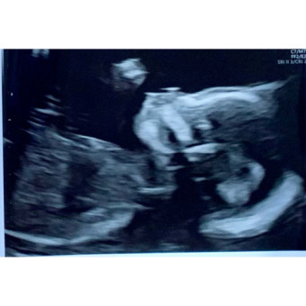 Ashley & Sam’s Baby Registry Photo.