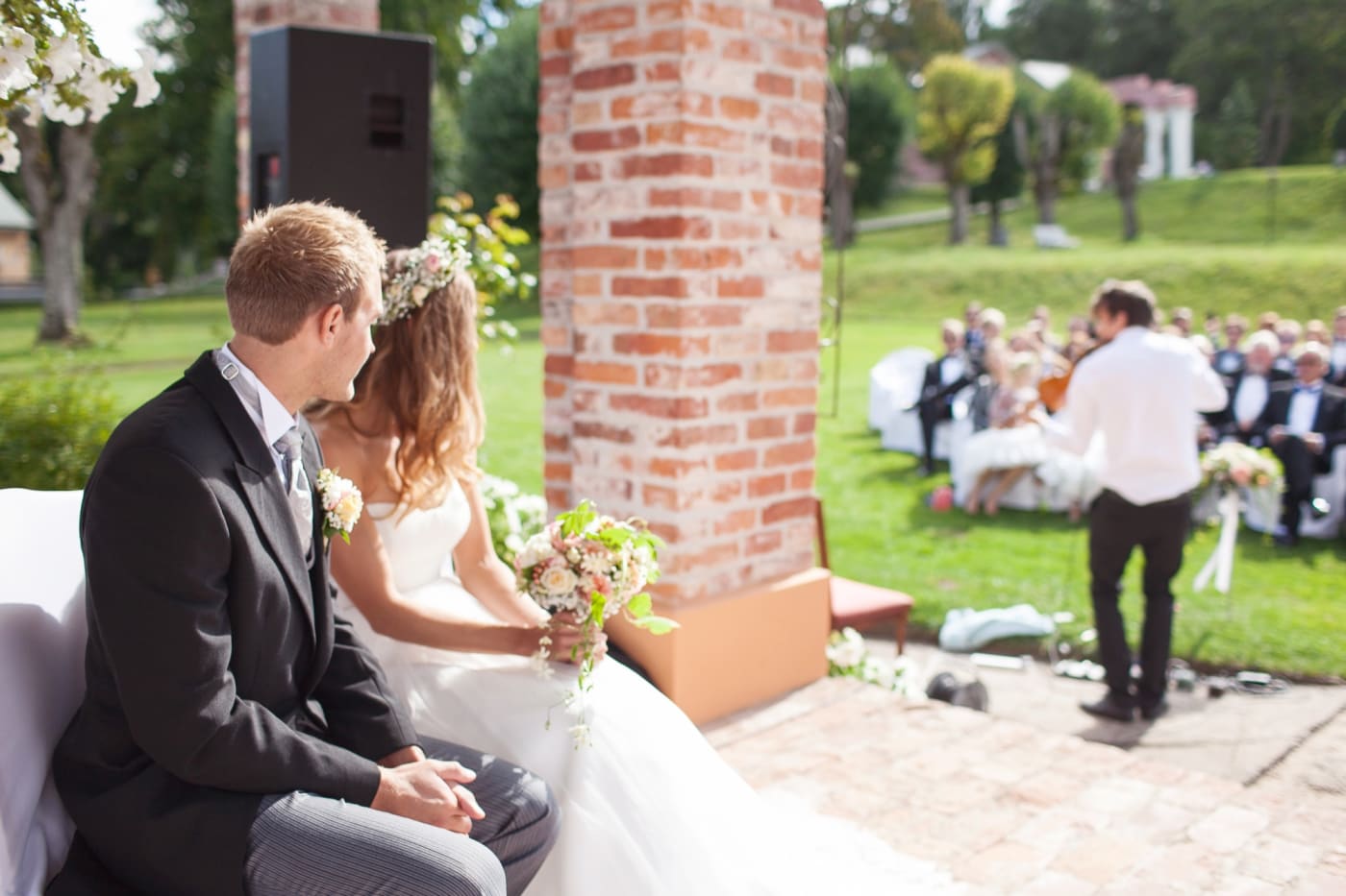 Joel Grainger playing violin during a Wedding ceremony