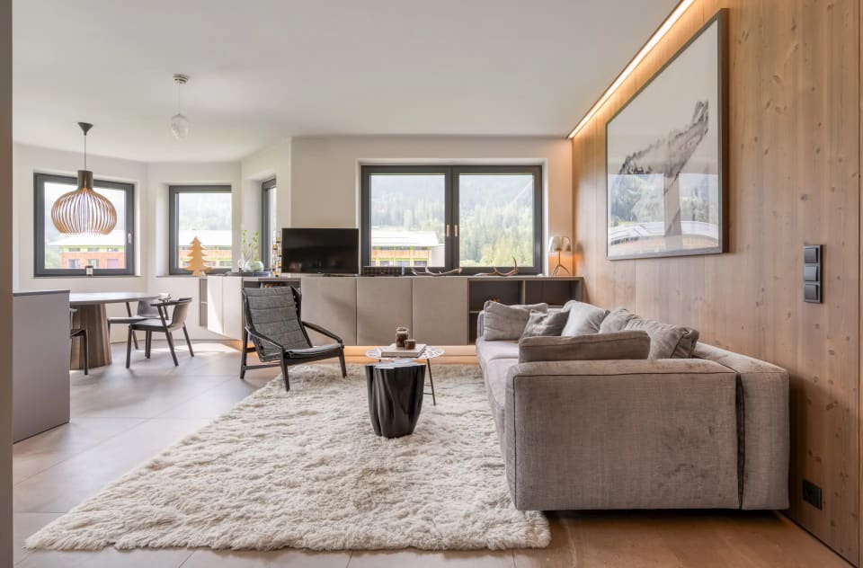 Open-plan living with mountain views in alpine ski residence Hinterstoder