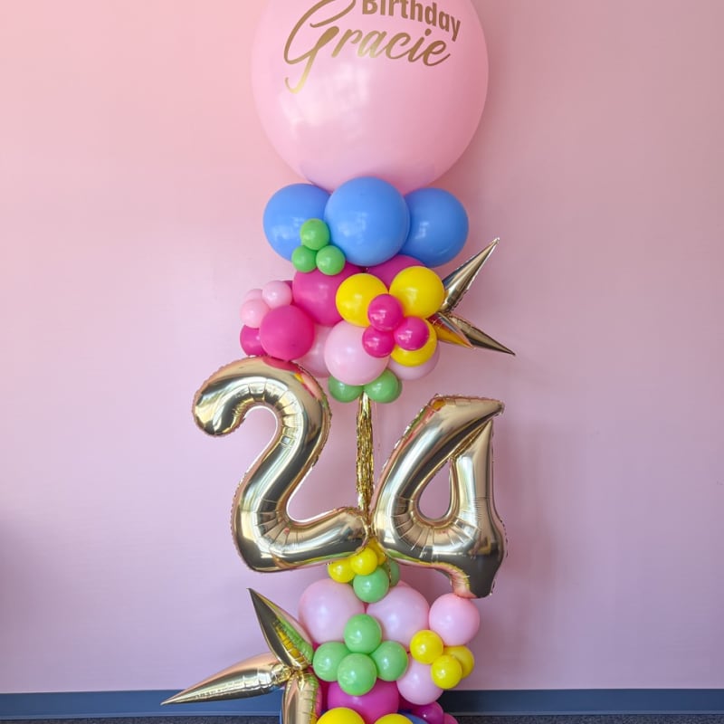 a balloon with the number twenty twenty five and a balloon with the number twenty five in the middle of it