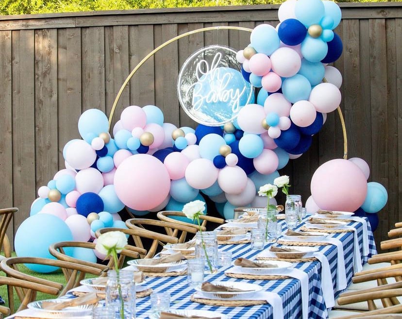 a table with a blue and white table cloth and a blue and white table cloth with a blue and white checkered table cloth