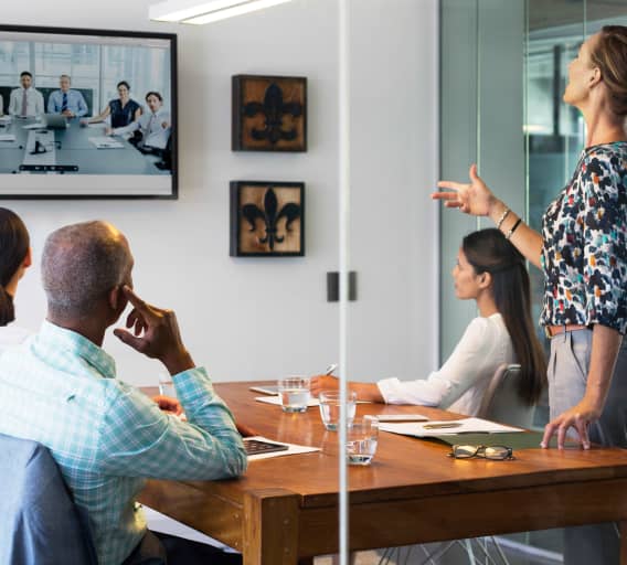 Photo of people at a conference room table