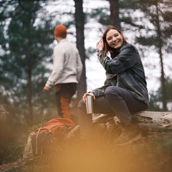 Happy woman in the forest.