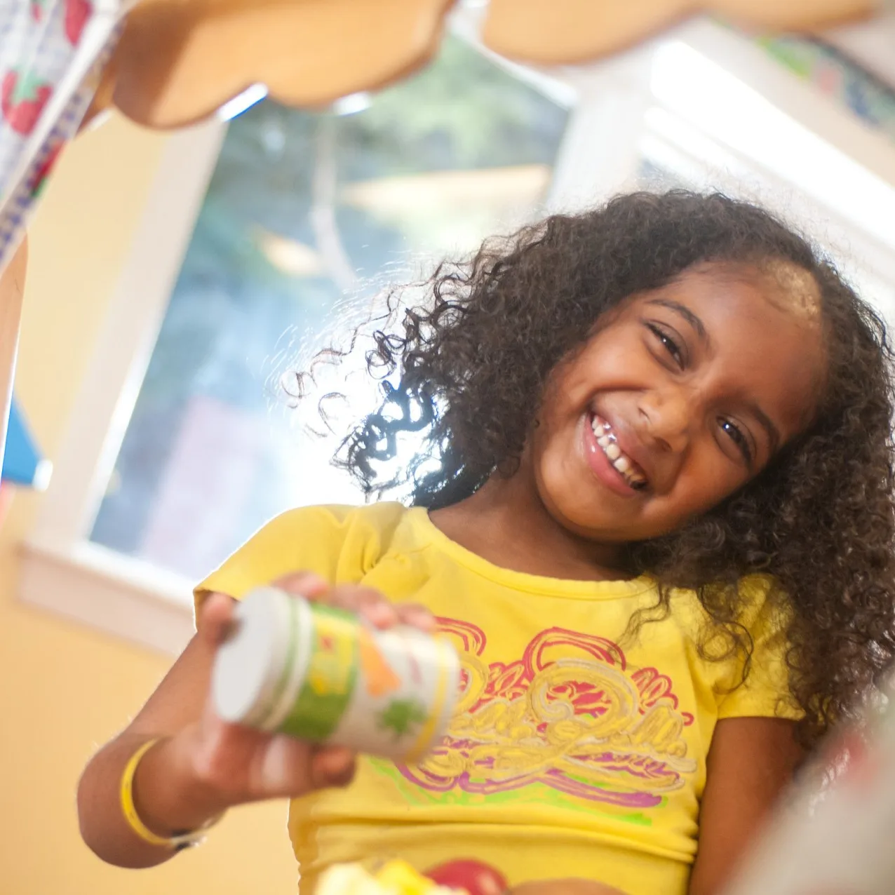 child playing and smiling