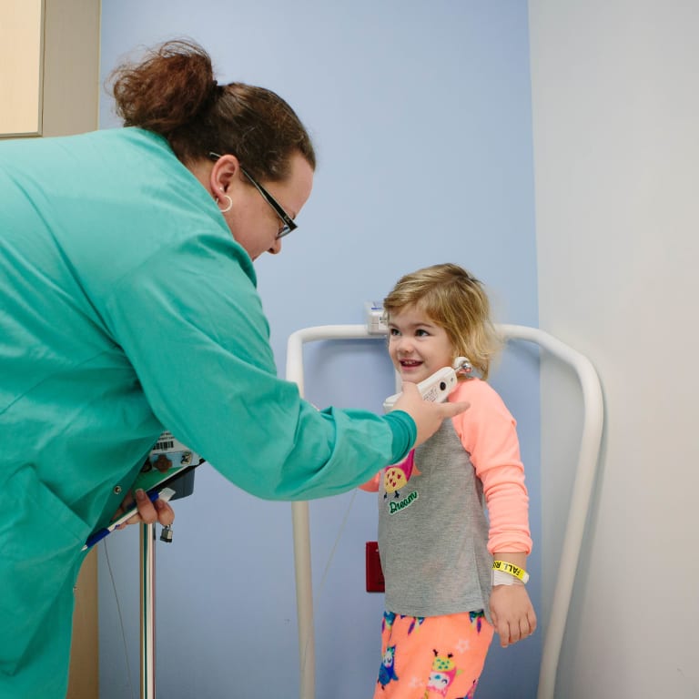 a provider performs an ENT test on a pediatric patient