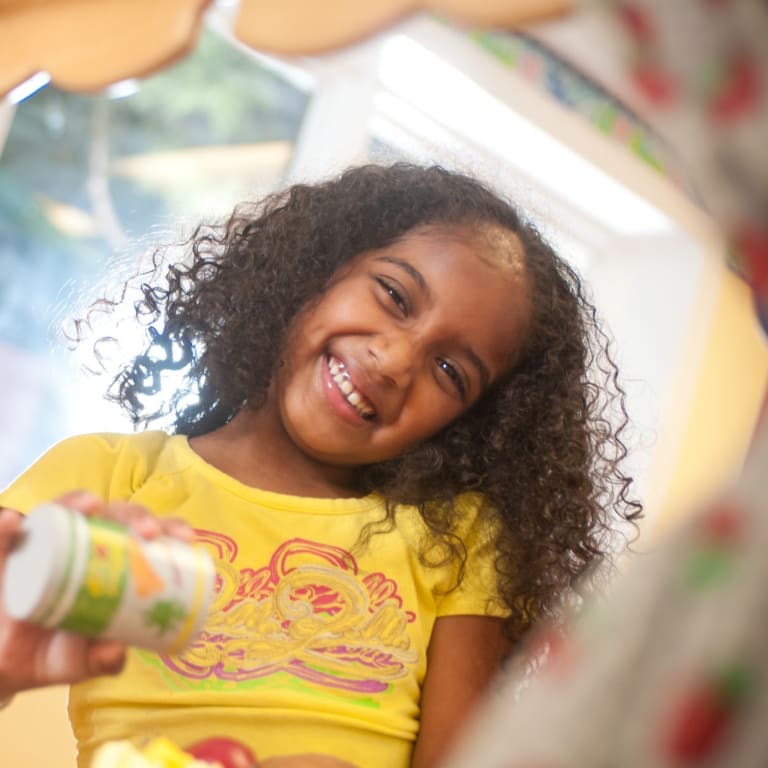 child playing and smiling