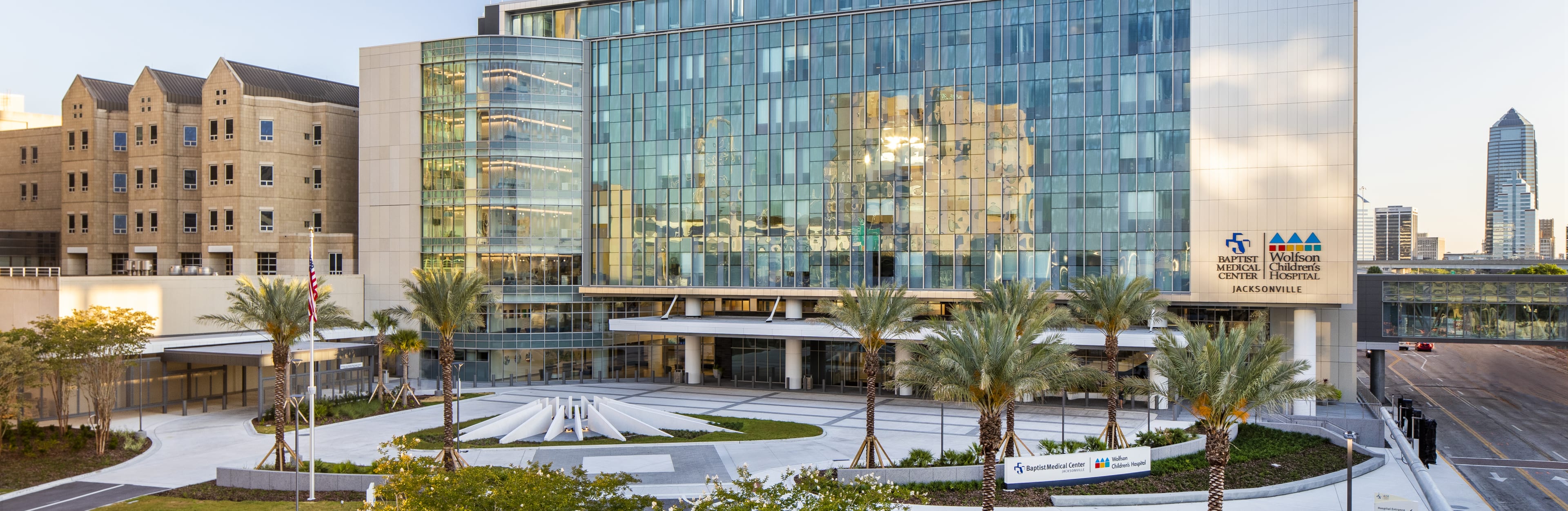 exterior photograph of the wolfson chidlren's critical care tower on a sunny day