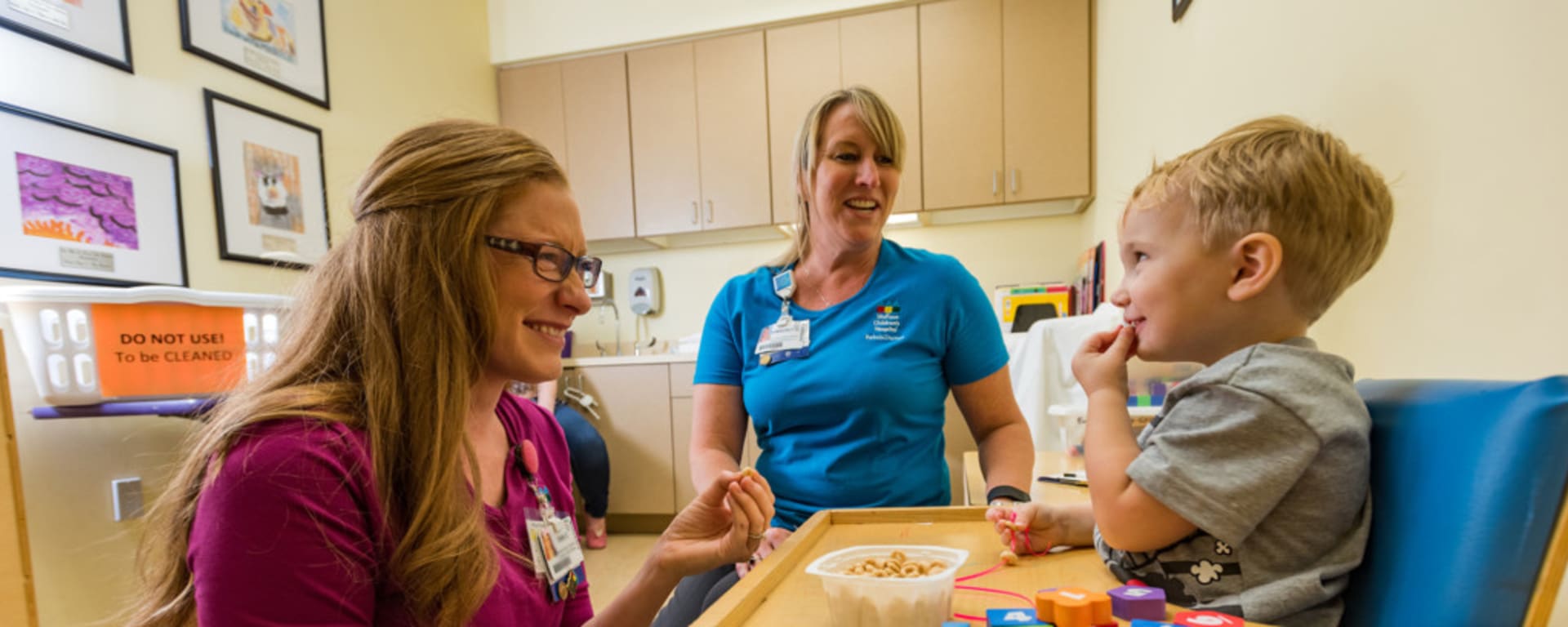 Speech-language pathologist working with a pediatric patient
