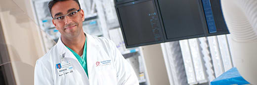 baptist heart specialist in front of monitor