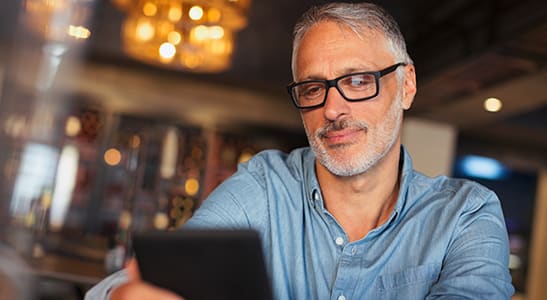 man reading his cell phone