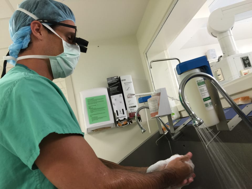 A brain surgeon prepping for craniosynostosis surgery.