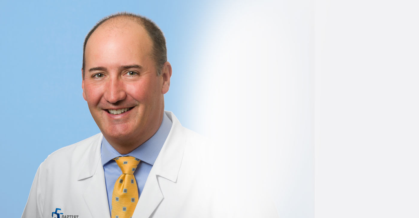 A headshot of Dr. Smith.