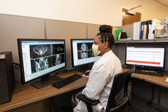 Doctor examining results on monitor