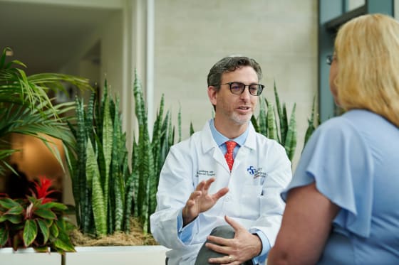 Dr. Landmann meeting with patient