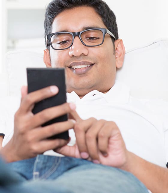 A man access his medical records through the patient portal from his mobile device.