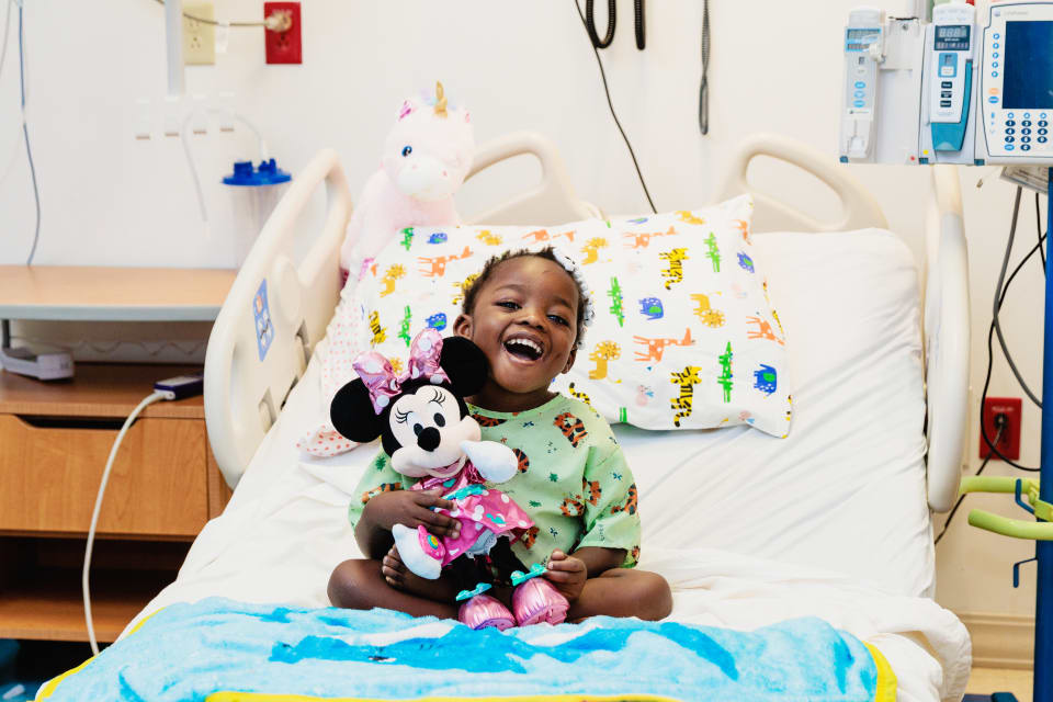 patient with donated stuffed animal