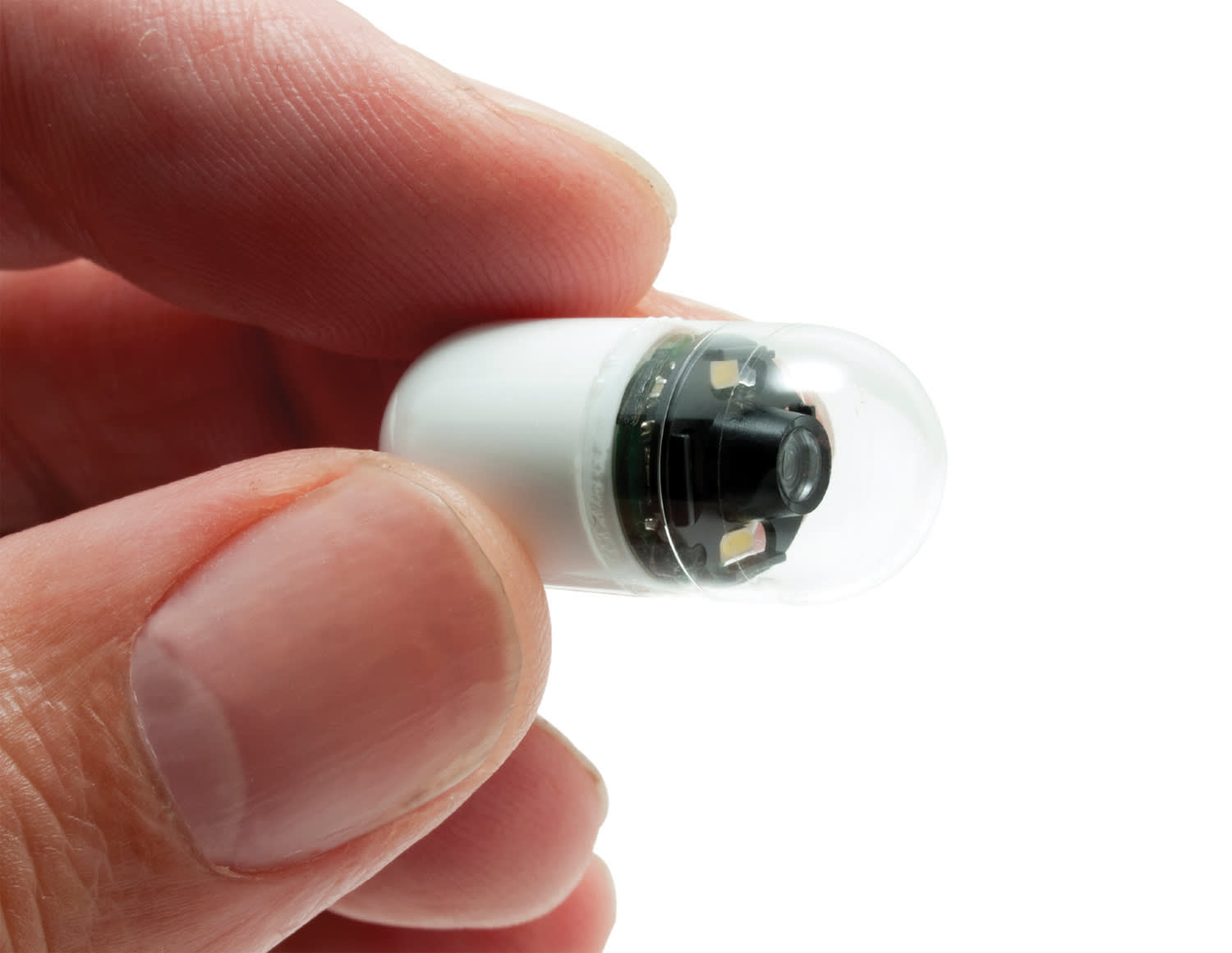 closeup of Kid-Sized Pill Camera - a tiny camera that looks like a pill capsule