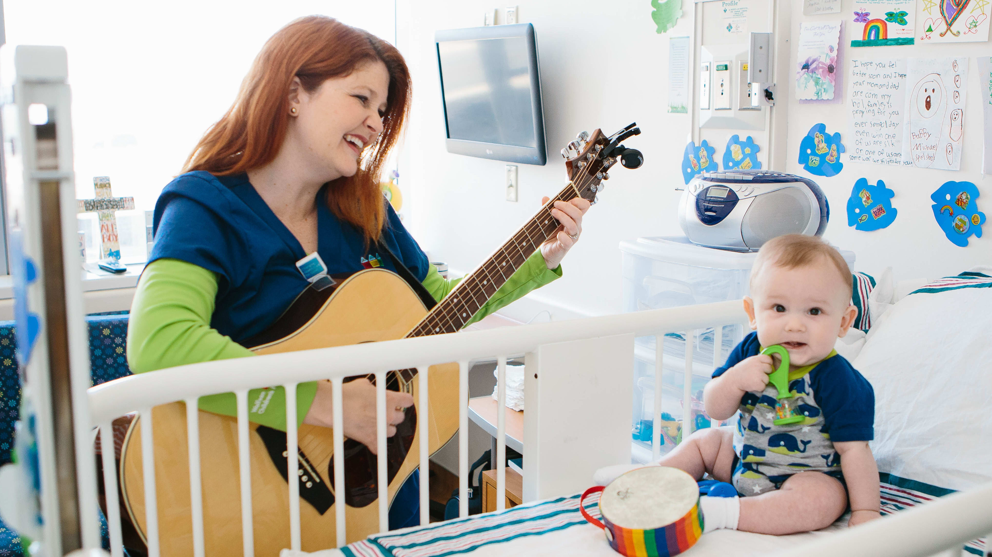 music therapist plays for baby