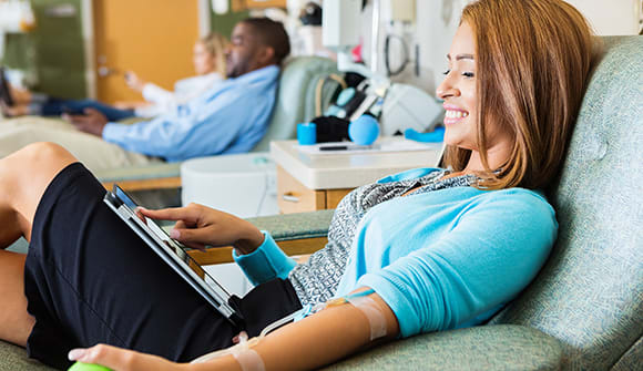 Man and woman donating blood