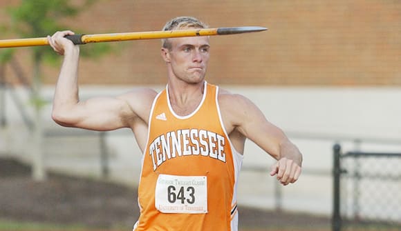 man throwing javelin