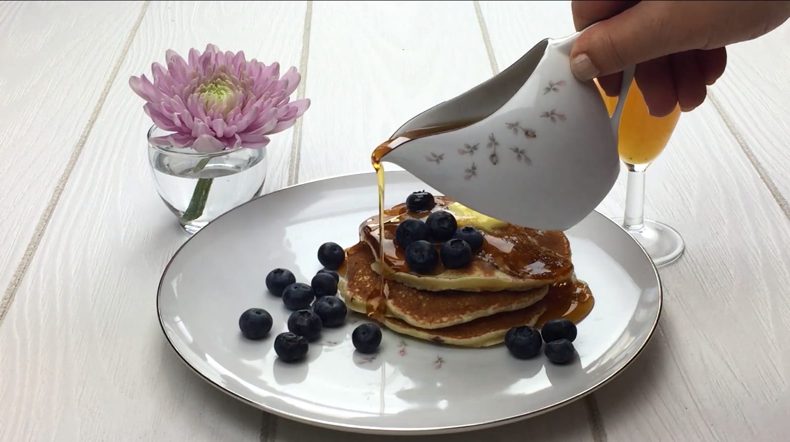 Blueberry ricotta pancakes with maple syrup