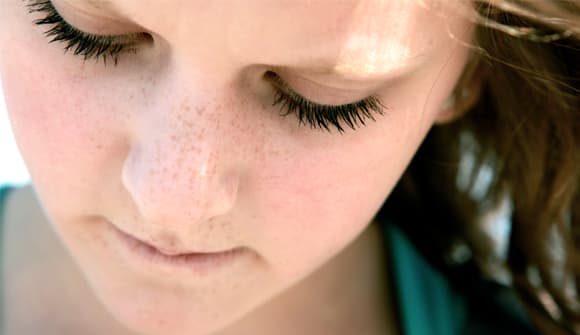 Young girl looking sad