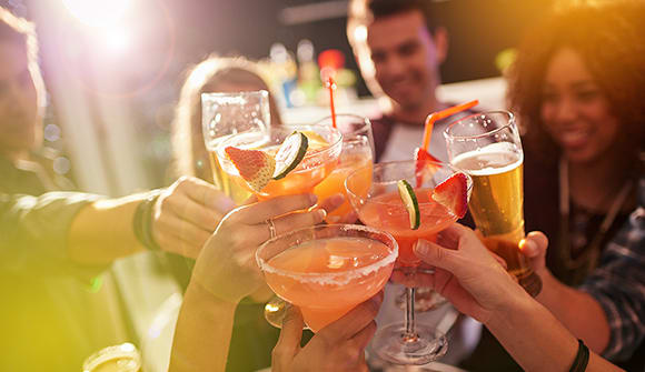 friends toasting with alcohol drinks