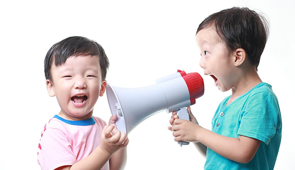 Little boys with megaphone