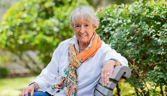 Patient Dickie Anderson relaxing on a park bench